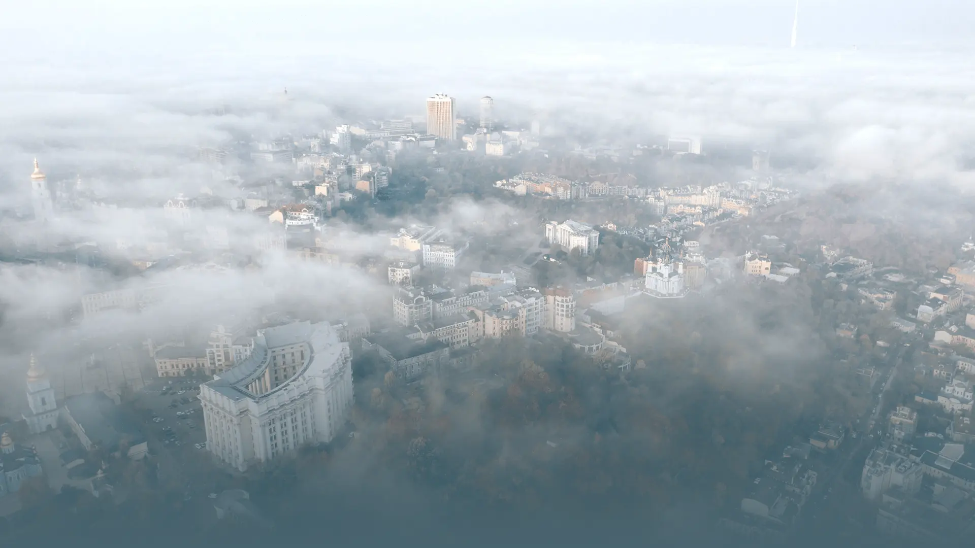 A gray scale map of the world with colored lines connecting various points
