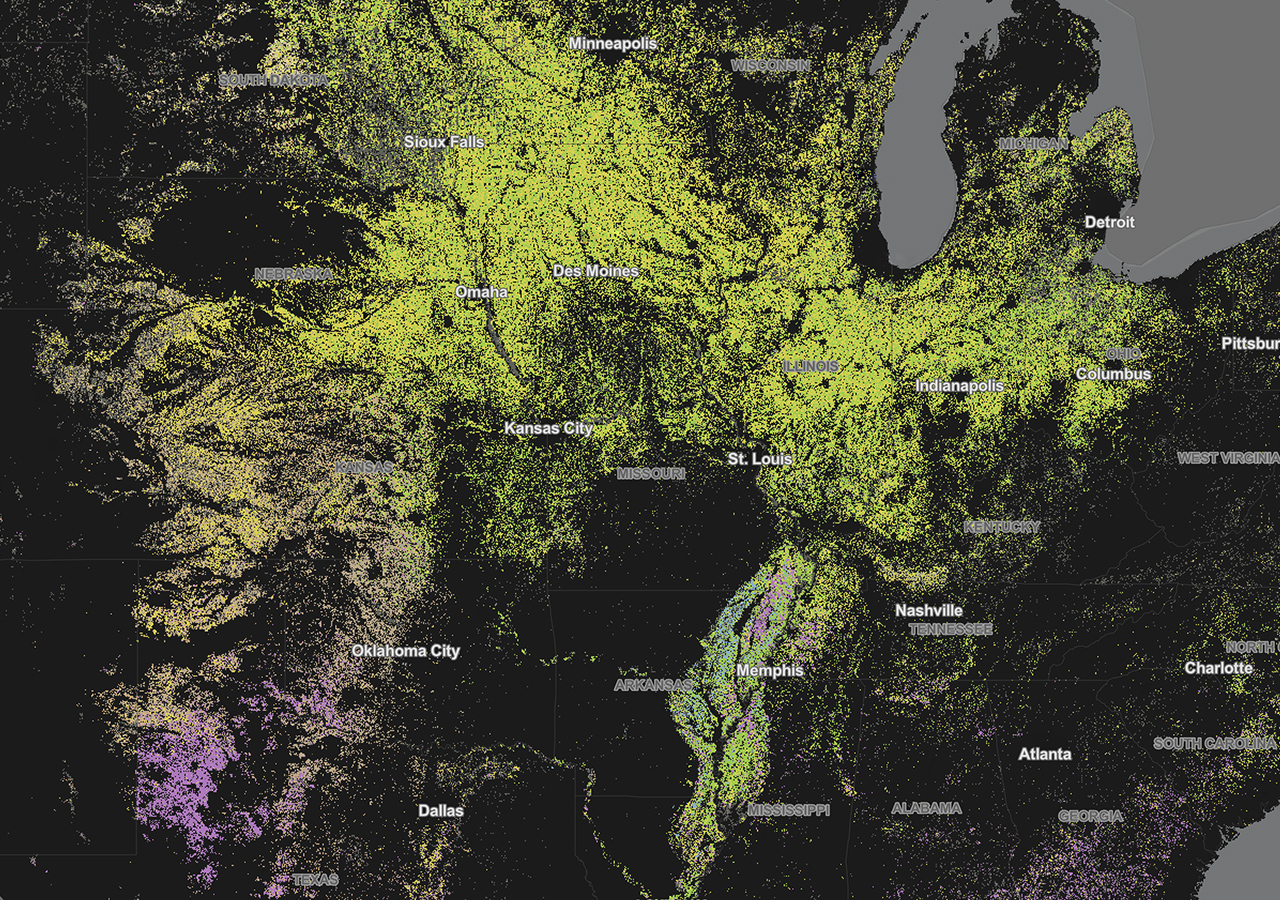 A contour map of midwestern U.S. in lime green and purple on a black background