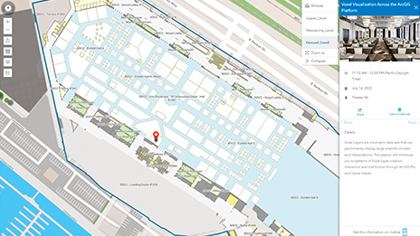 Digital indoor map of a complex building containing pictures and asset data, white buildings, and gray squares for exterior