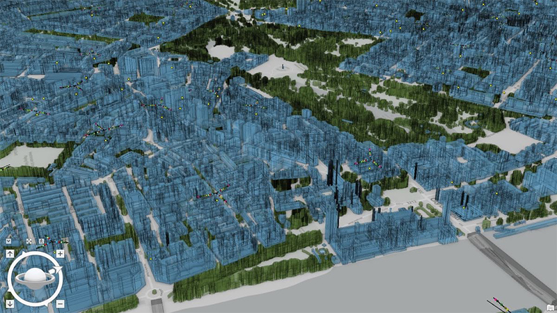3D representation of an area in Britain showing buildings in green and blue based on network management data