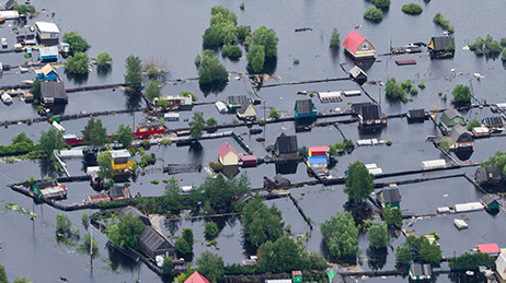 Residential area nearly fully submerged under water