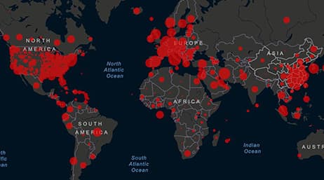 Dark grey map of the world with red circles on it