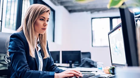 Woman using a desktop computer