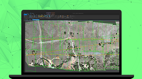 Laptop showing a program with remote sensing map production 