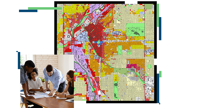 Four people around a table; a map shaded red, green, yellow, and purple