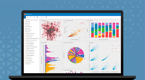 A graphic of a laptop monitor displaying a map dashboard with multicolored maps, charts, and graphs