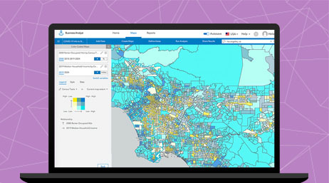 A graphic of a laptop monitor displaying a map with areas colored in yellow and pink on a blue background