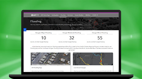 A desktop computer showing an ArcGIS Hub website about flooding with numbers of incidents and maps users can explore