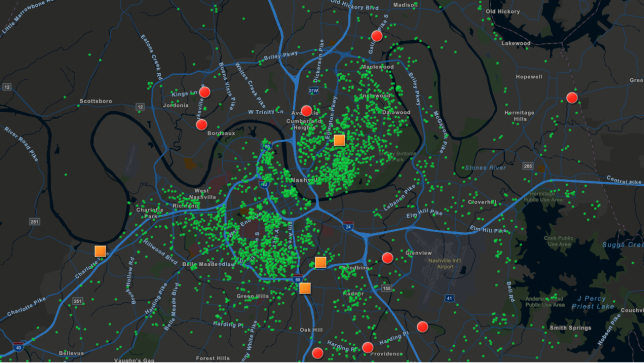 Dark gray map with blue lines and green dots