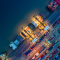 Aerial view of ship at port and shipping containers